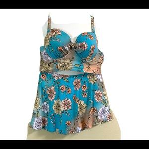 Rock the beach with confidence in this turquoise/pink floral two piece swimsuit!